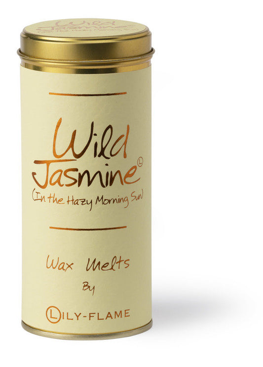 A cylindrical metal tin of Lily-Flame Wax Melts in the scent 'Wild Jasmine (In the Hazy Morning Sun)'. The tin has a cream-colored label with brown text and a metallic gold lid and base, set against a plain white background.