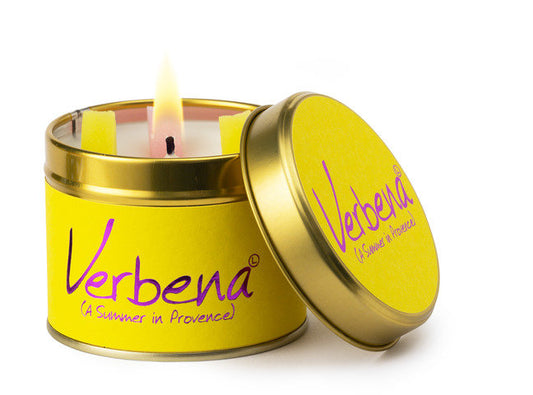 YellowVerbena candle in a tin with a lit candle on a white background