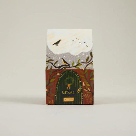 ST Eval product packaging with a door and birds design on a beige background
