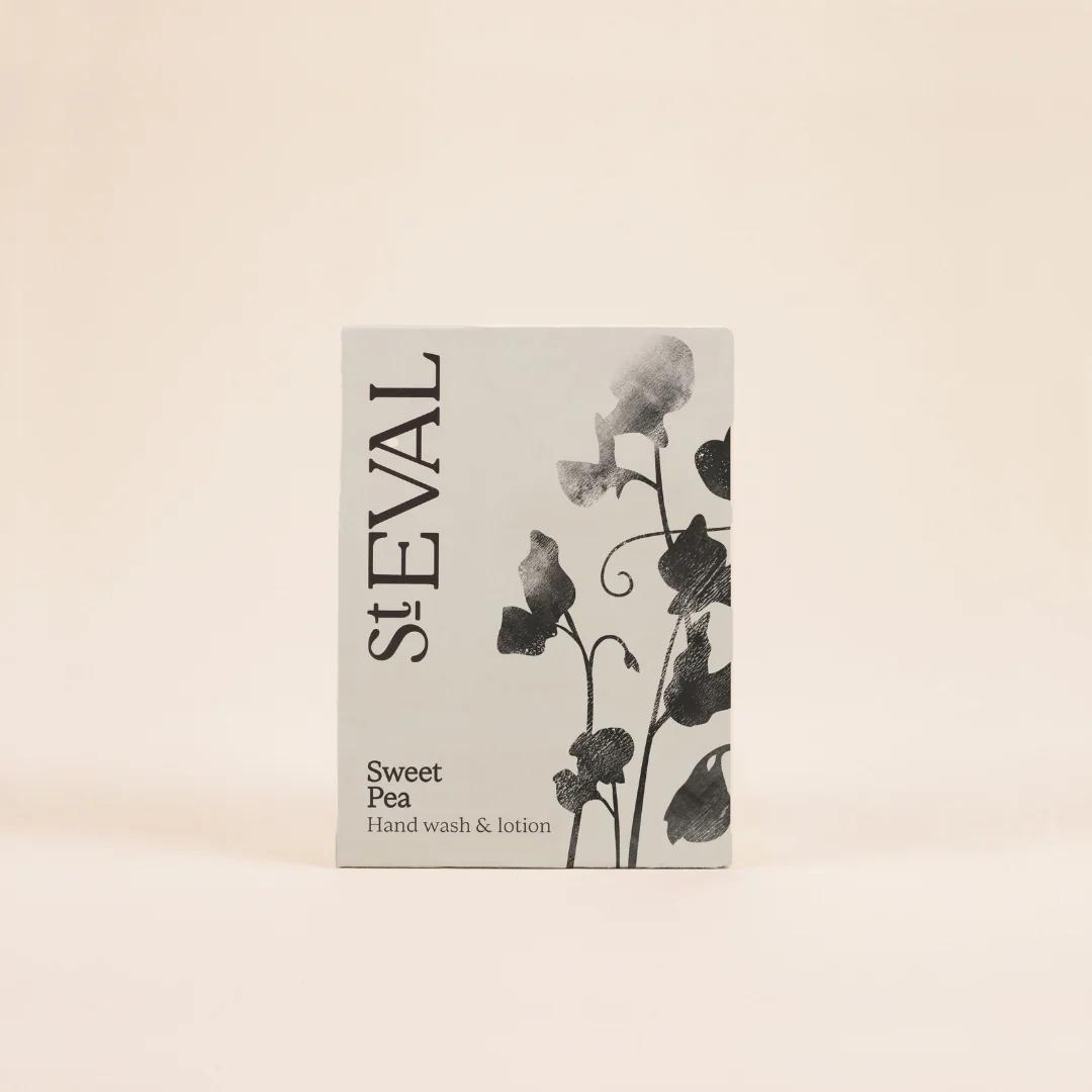 St. Eval Sweet Pea hand wash & lotion packaging on a beige background