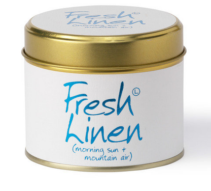 A cylindrical metal tin with a white label and gold lid, labeled 'Fresh Linen' in blue text, on a clean white background.