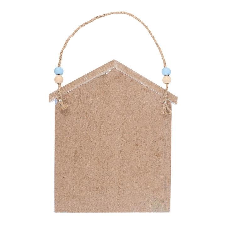 Hanging decorative sign with jute rope and beads on a white background