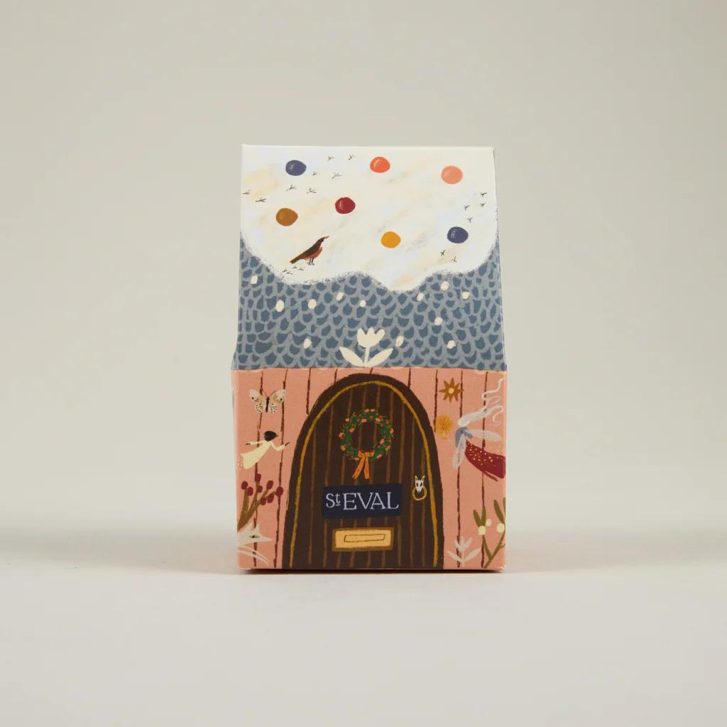 Decorative product packaging with a door illustration and 'ST EVAL' branding on a light gray background