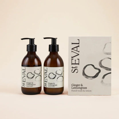 Two St. Eval Ginger & Lemongrass hand wash bottles and a box on a beige background