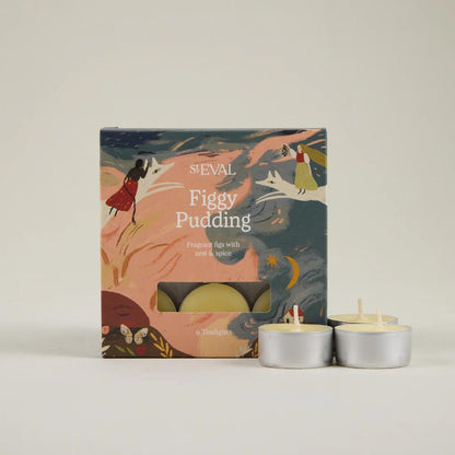 ST Eval Figgy Pudding candle packaging with two candles on a light background