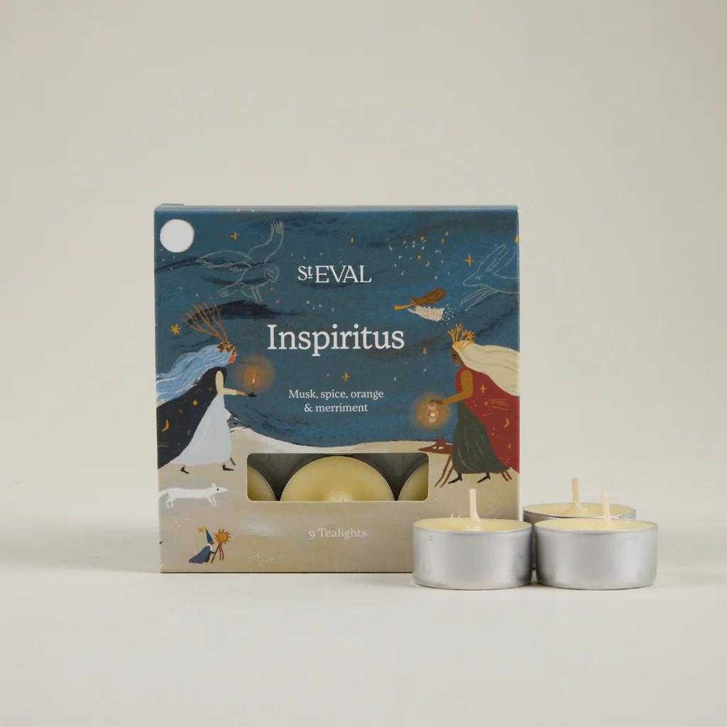Packaged candles with 'ST Eval' branding on a neutral background