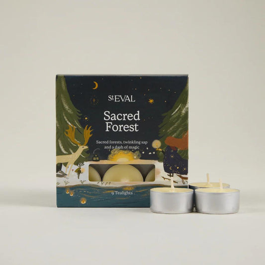 ST Eval Sacred Forest tea light candles packaging with two lit candles on a neutral background