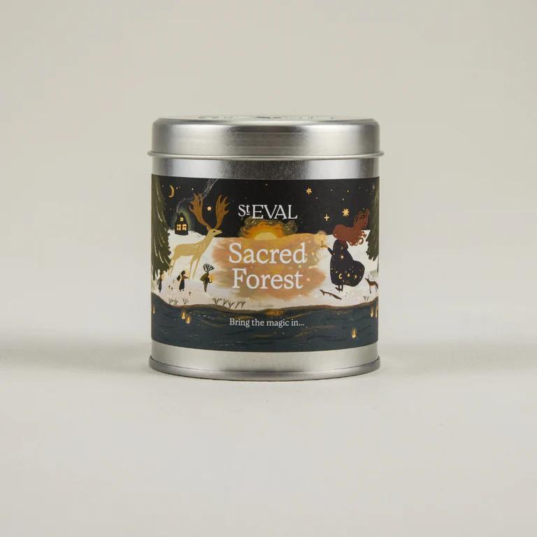 ST EVAL Sacred Forest candle tin on a light beige background