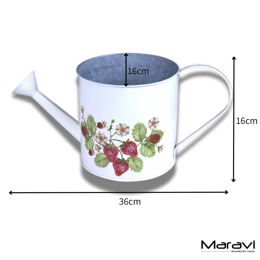 White watering can with floral design and measurements on a white background, featuring the Maravi brand.