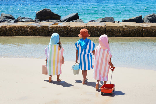 Kids Poncho Unicorn Waves Ages 7-10 by Dock and Bay 