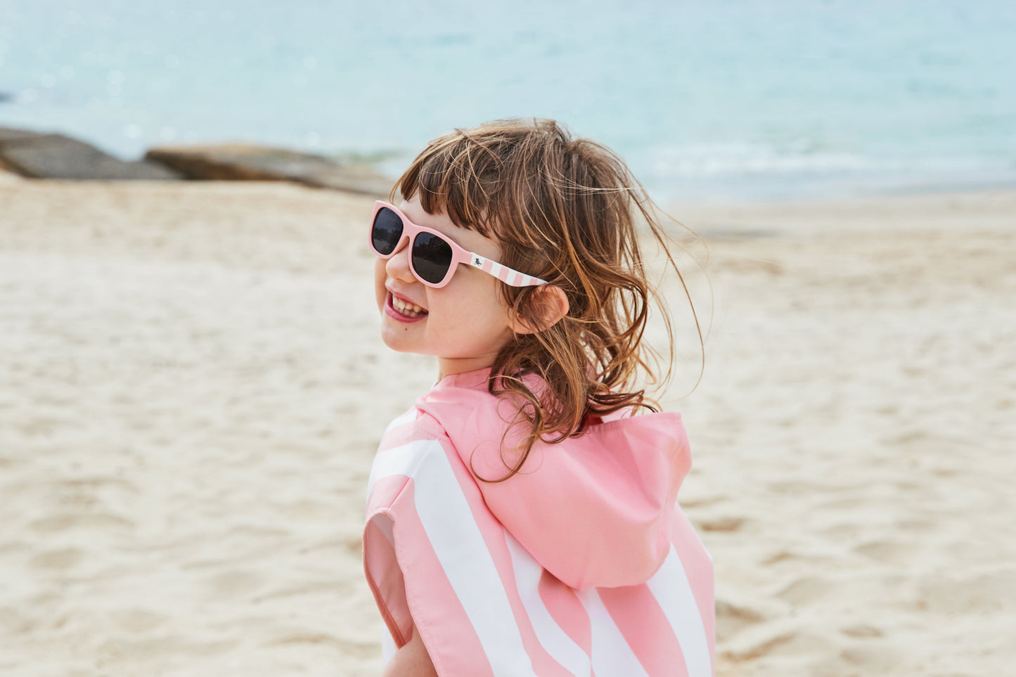 Kids Poncho Malibu Pink by Dock and Bay for ages 4-7
